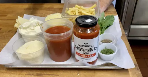 a tray with ingredients that you can use to make both baked ziti and lasagna