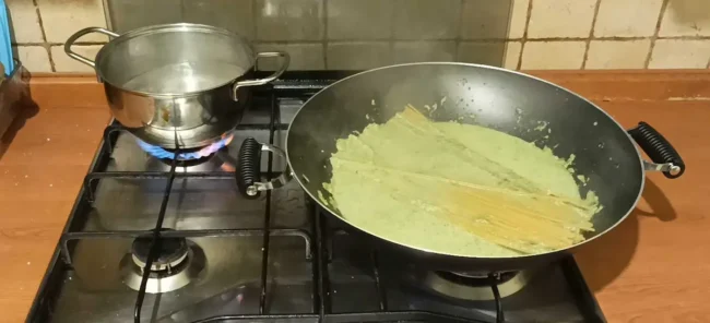cooking pasta in cabbage pesto and water