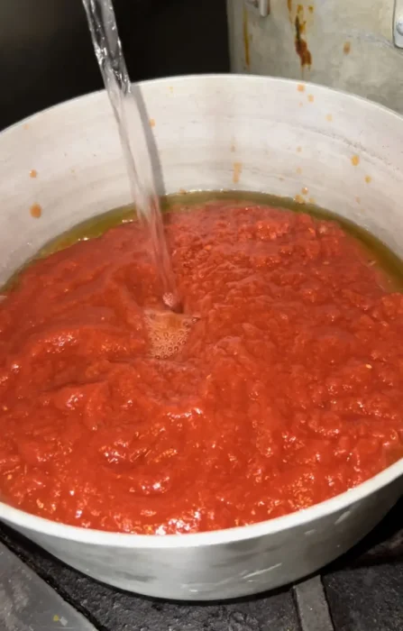 homemade marinara sauce simmering