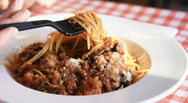 a portion of spaghetti with a sauce made from marinara