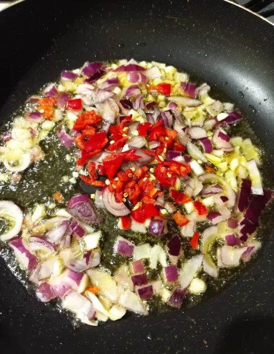 sauteeing garlic, onions and peppers