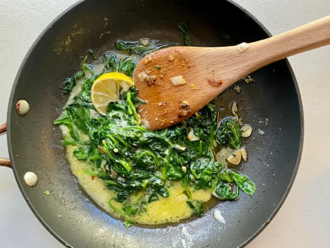 adding lemon to italian sauteed spinach