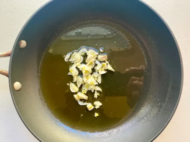 olive oil and garlic in a large skillet