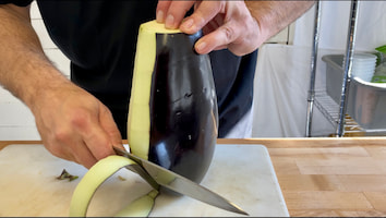 peeling an eggplant
