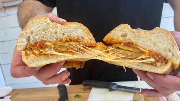 a sandwich made with eggplant parmigiana