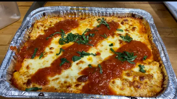 a baking dish full of baked ziti made with this recipe