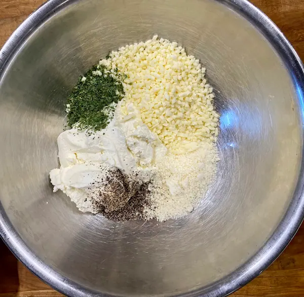 ricotta mixture in a bowl for baked ziti