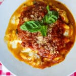 a plate of gnocchi sorrentina, a traditional Italian dish made with marinara sauce