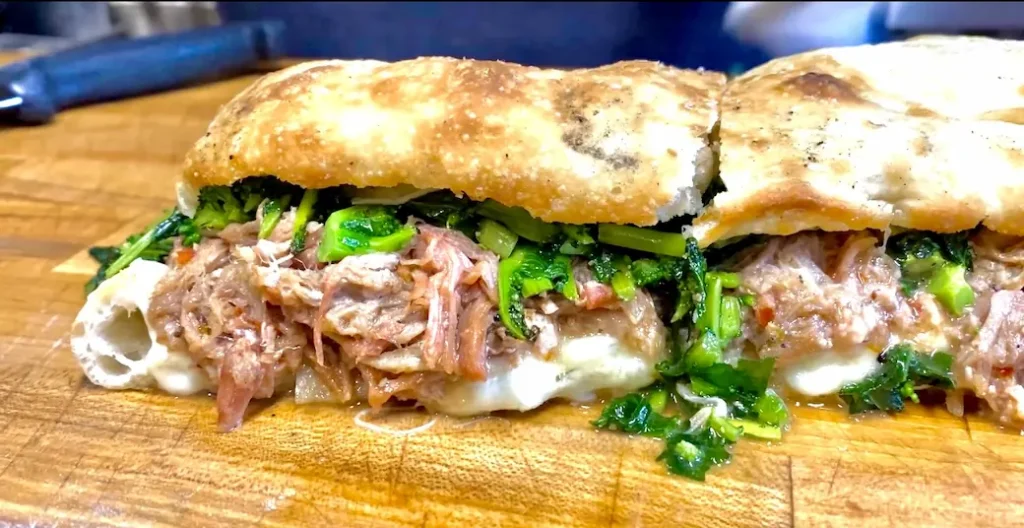 a broccoli rabe pork sandwich