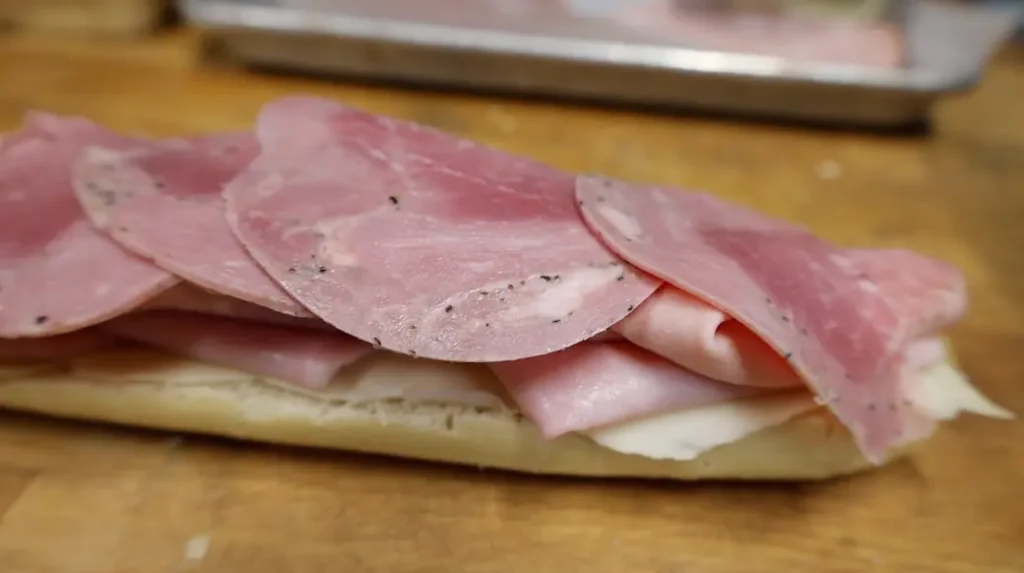 how to make an italian sub sandwich step 4: capicola on mortadella