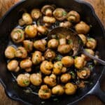 a pan full with caramelized onions and mushrooms made with this recipe