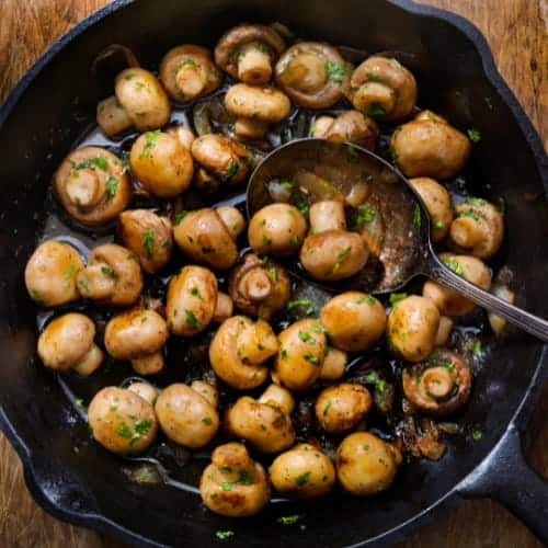 a pan full with caramelized onions and mushrooms made with this recipe