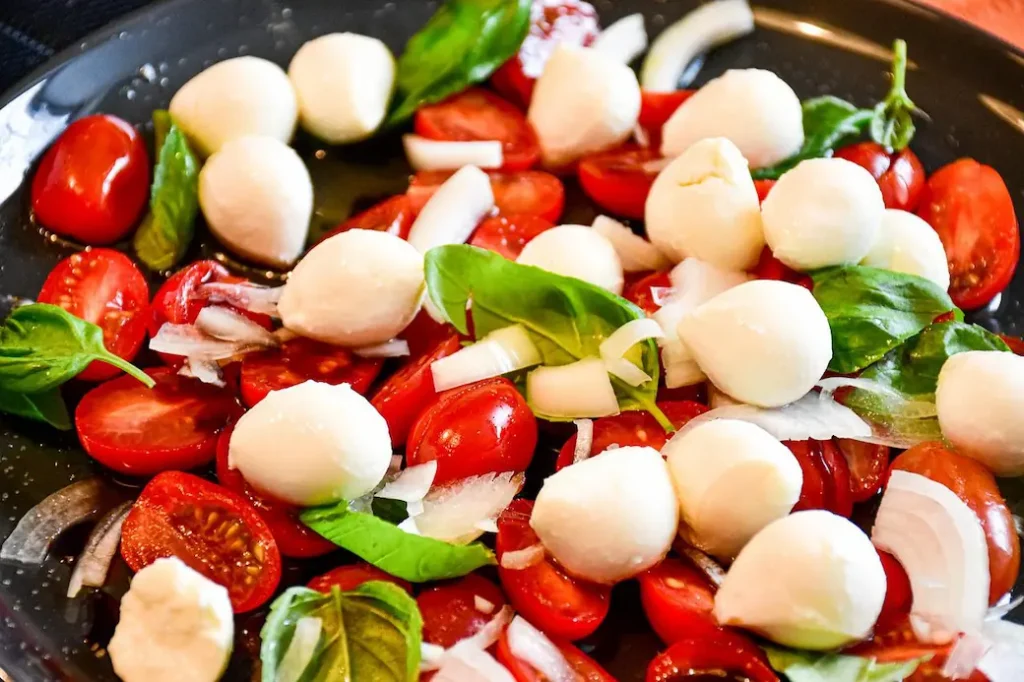 caprese is a great salad to serve with eggplant parmesan