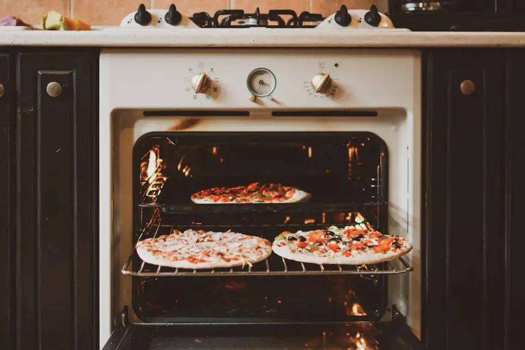 how to reheat pizza in a conventional oven