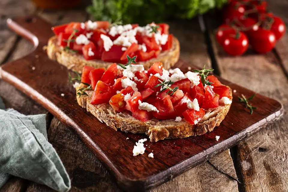 2 bruschettas ready to be served with risotto