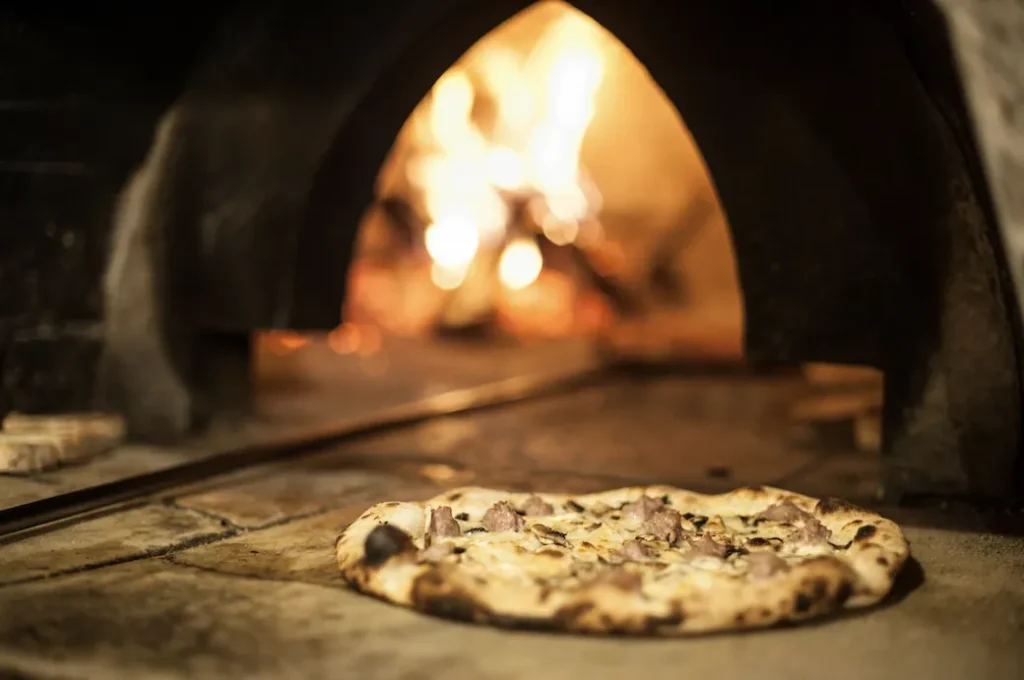 a white pizza from Dar Poeta, one of Rome's best pizza places