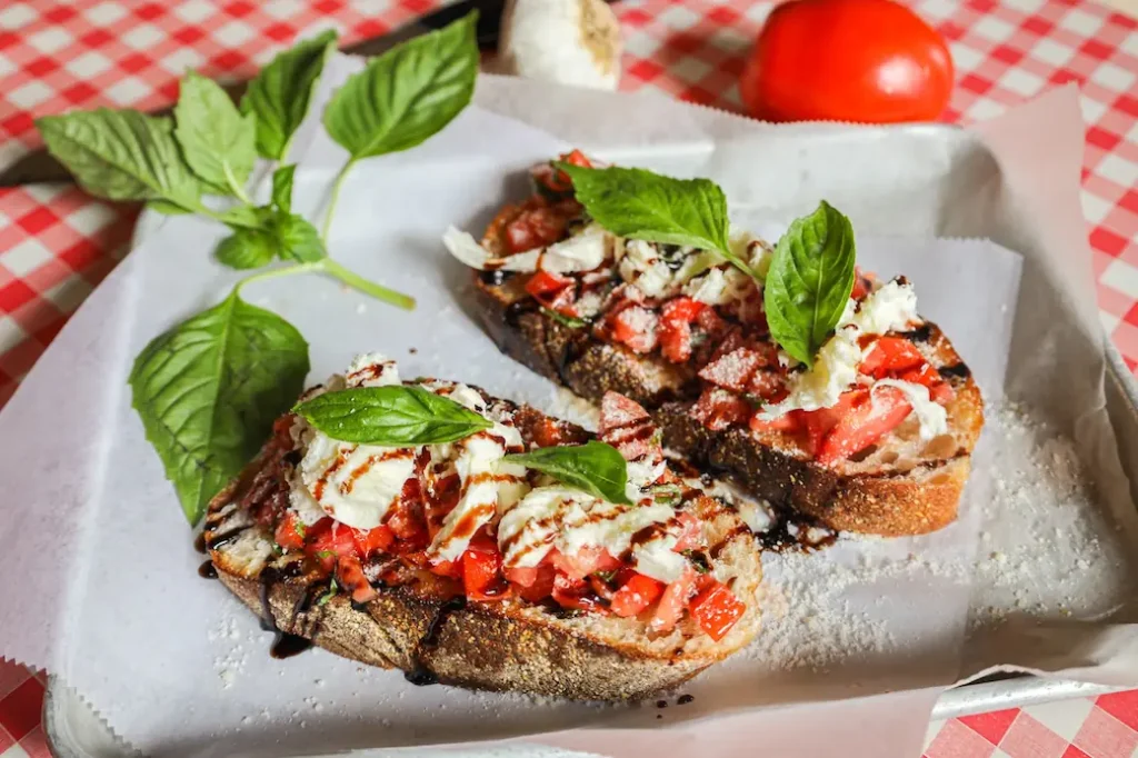 two bruschettas on a tray