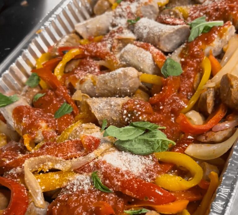 a baking dish full with the baked italian sausage you'll going to learn with this recipe