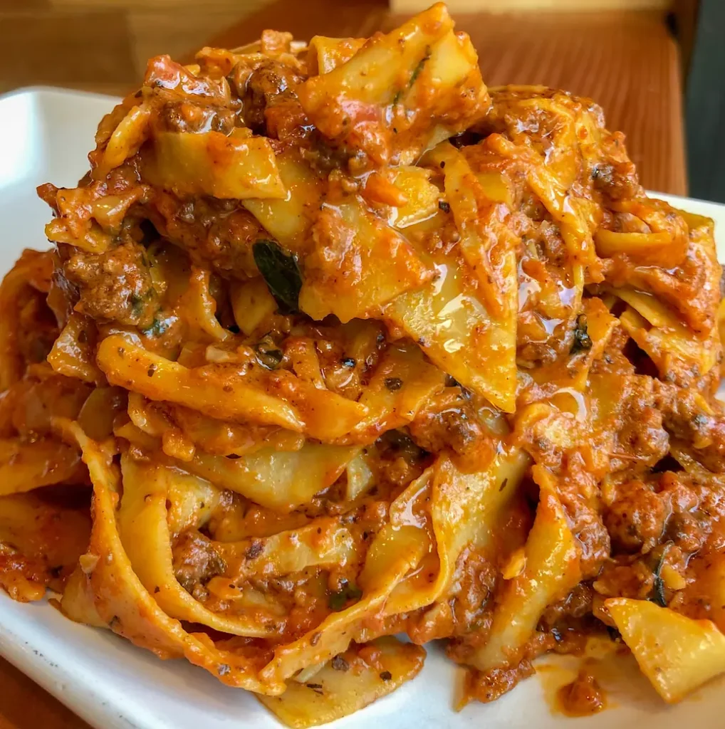 pappardelle pasta with ragu made from jarred tomato sauce
