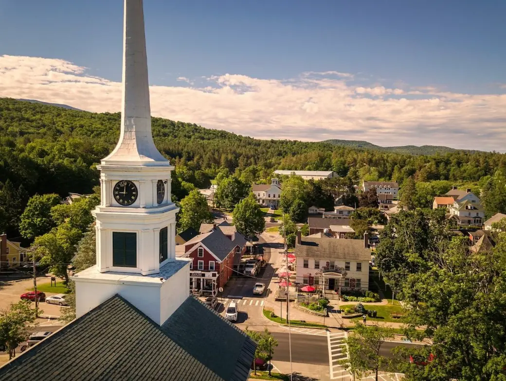a panoramic view of Stowe, Vermont, and its famous white Community Church.