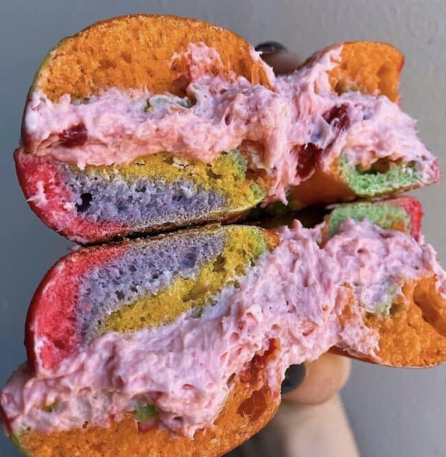 a colorful breakfast bagel sandwich