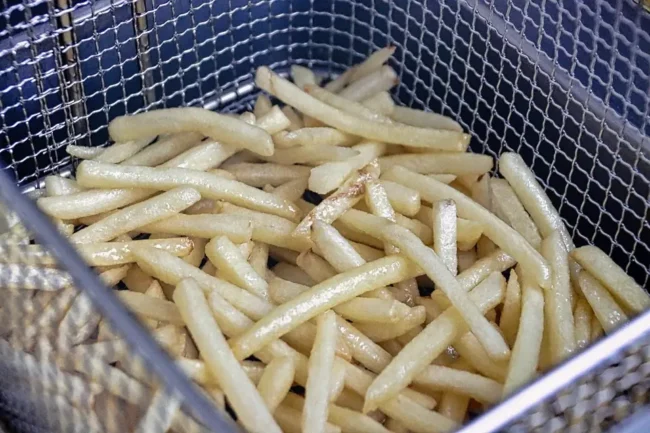 stick fries in a deep fryer