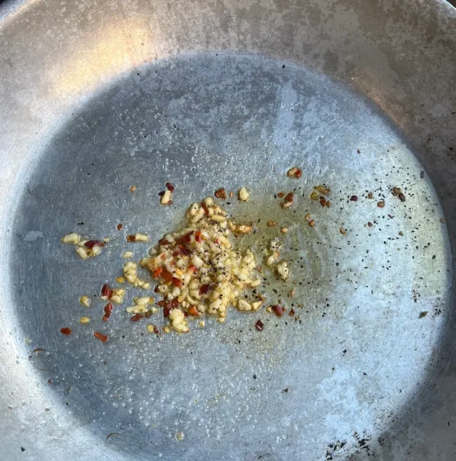 red pepper flakes in a large skillet