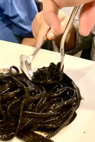 squid ink spaghetti for a Christmas Eve dinner party