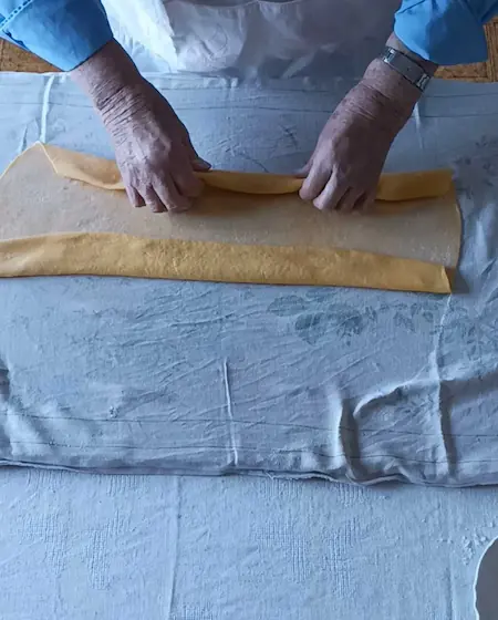 https://mortadellahead.com/wp-content/uploads/2023/01/folding-pasta-dough.webp