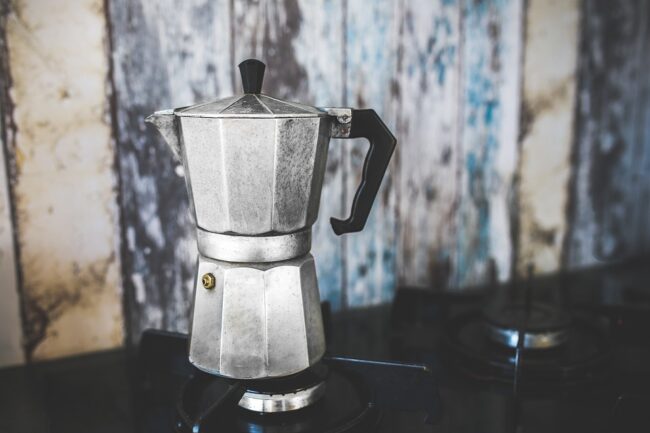 a mocha pot on a stovetop burner