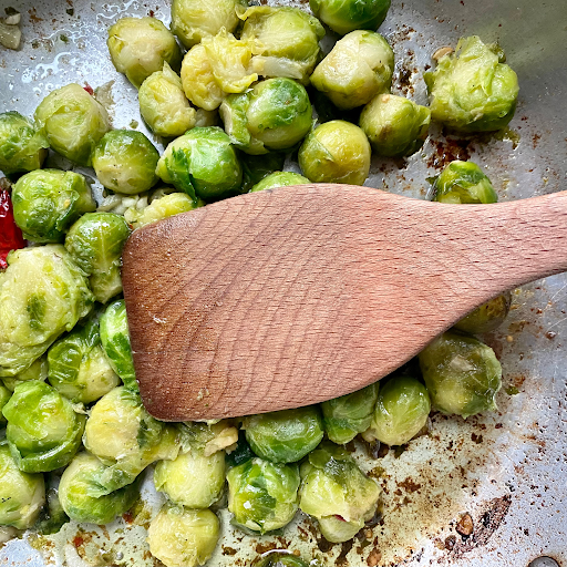 add the frozen Brussels sprouts to the pan