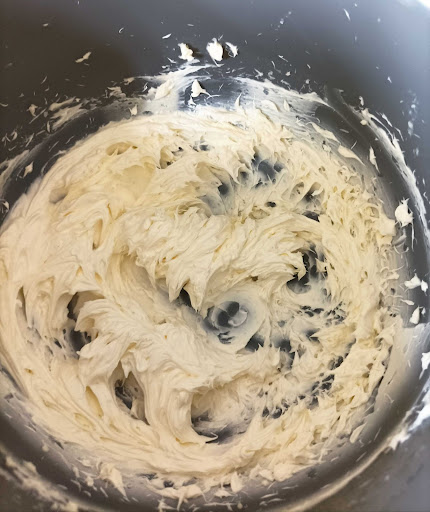 buttercream for espresso frosting - alt text: whipping unsalted butter at room temperature