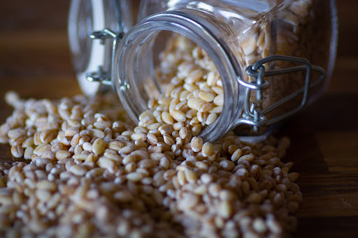 cereal grains coming out of a jar