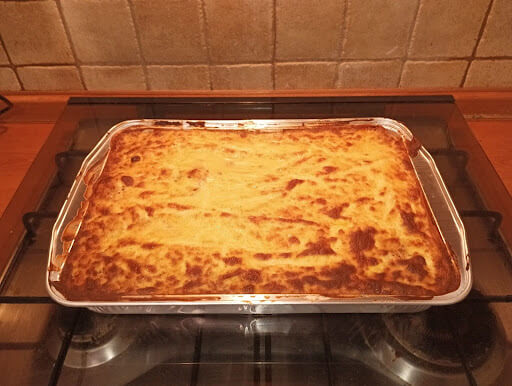 greek lasagna recipe-pastitsio in casserole dish