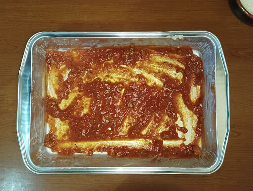 meat sauce layer in lasagna pan